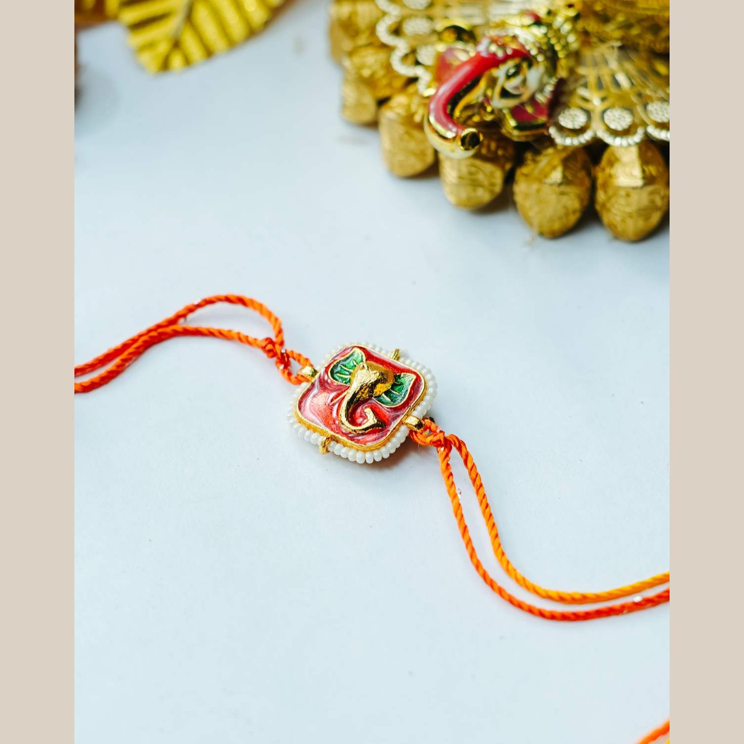 tatvayog-silk-thread-with-pearls-around-square-meenkari-lord-ganesh