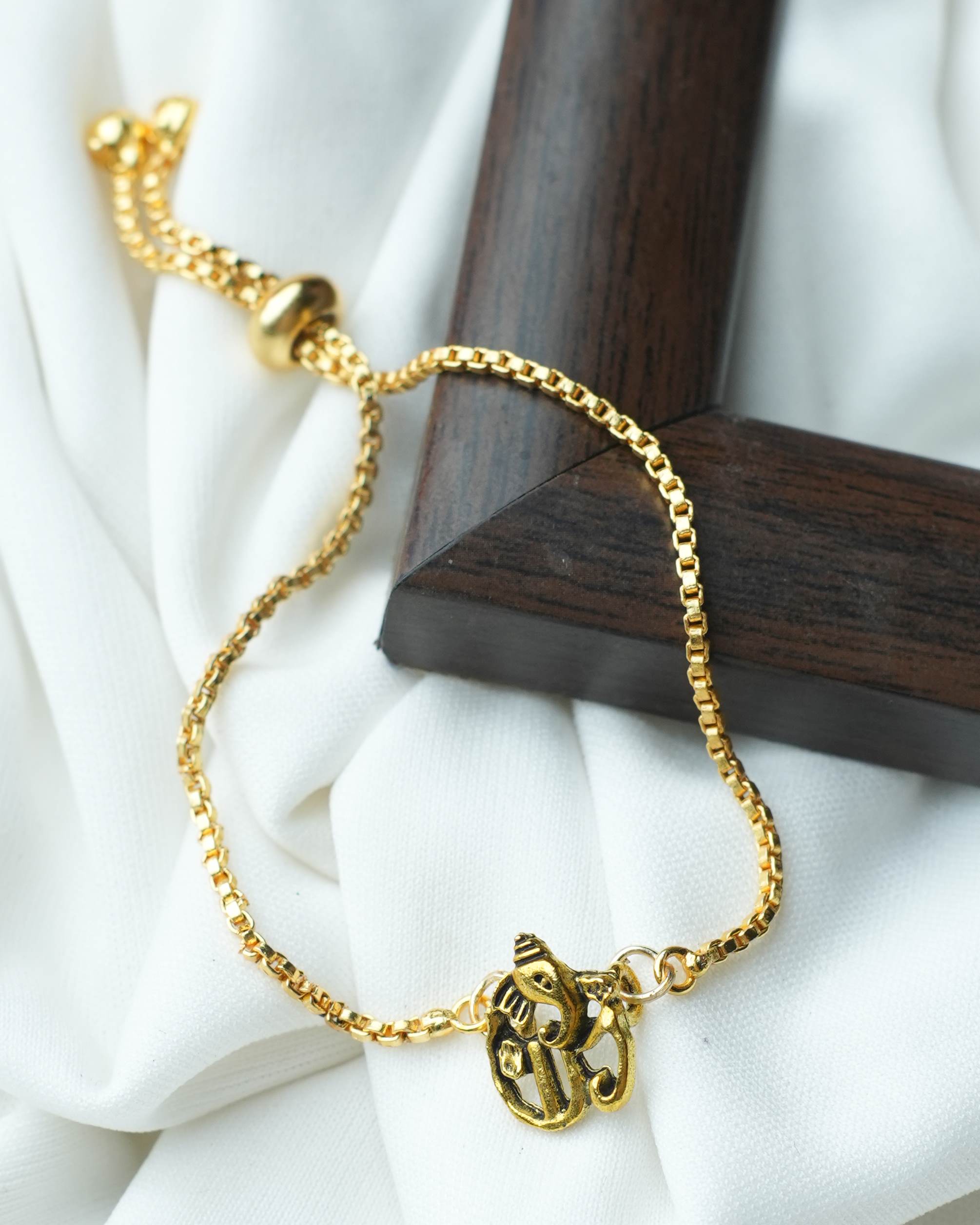 tatva-bracelet-gold-plated-bracelet-with-gold-oxidised-lord-ganesh