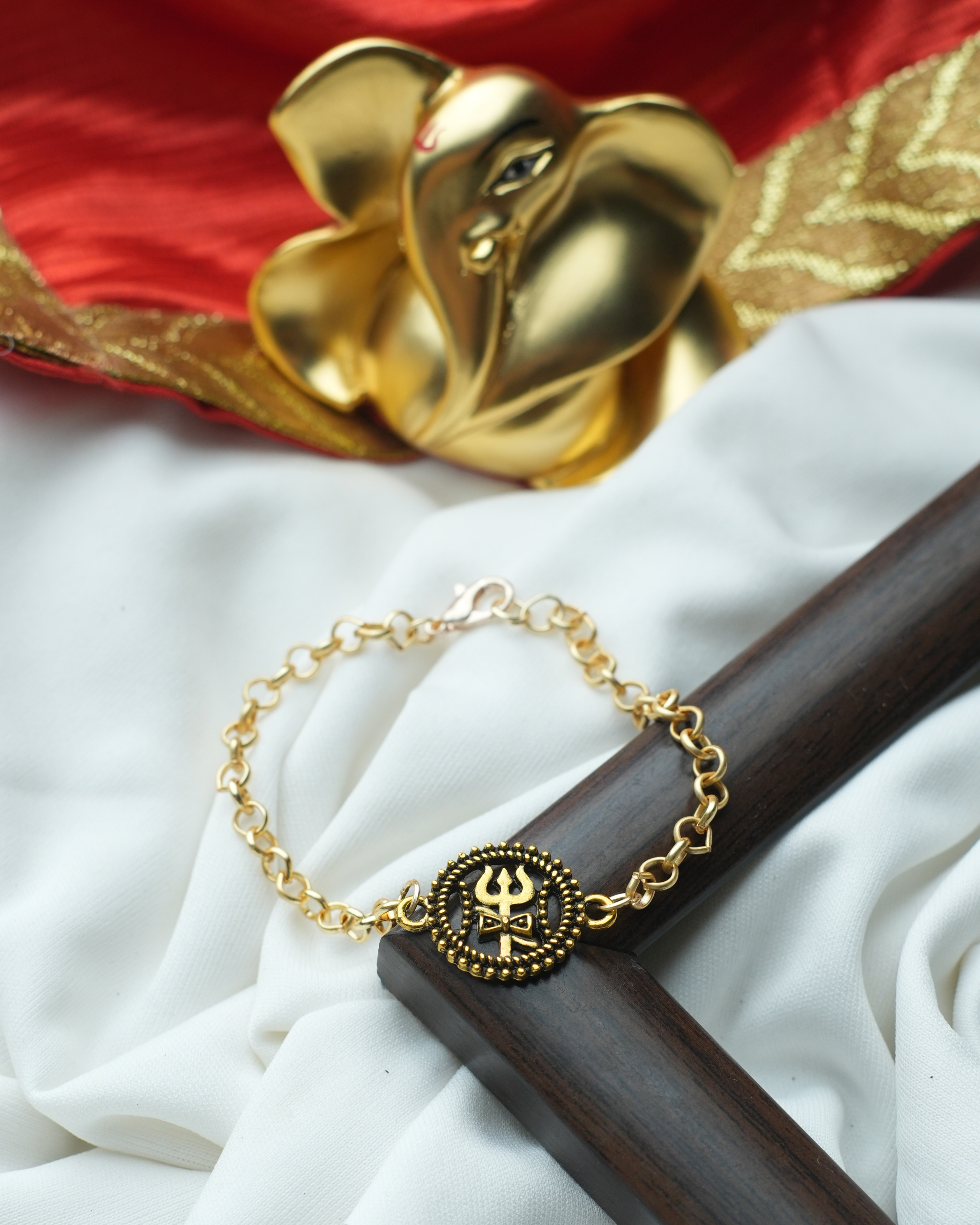 tatva-bracelet-|-golden-chain-with-gold-oxidised-trishul