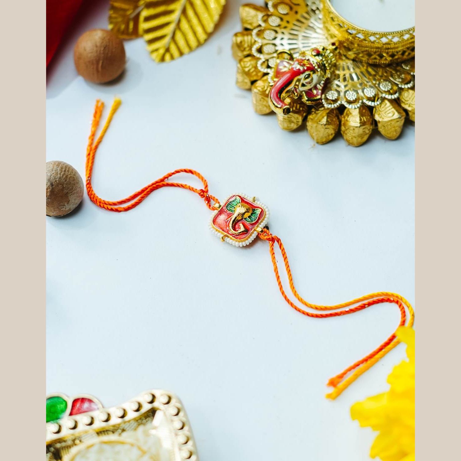 tatvayog-silk-thread-with-pearls-around-square-meenkari-lord-ganesh