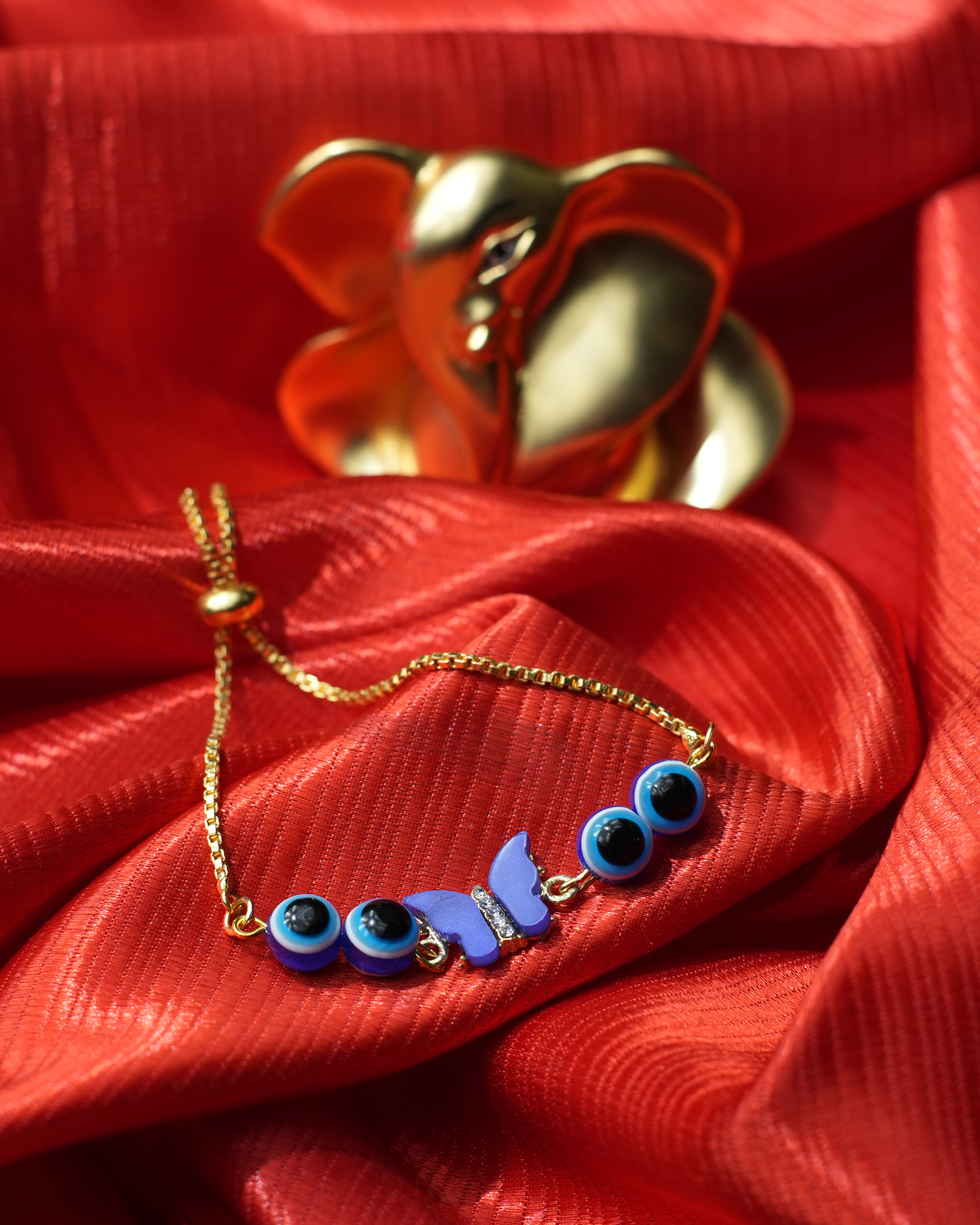 tatva-bracelet-|-golden-bracelet-with-evil-eye-beads-and-flower-evil-eye-charm